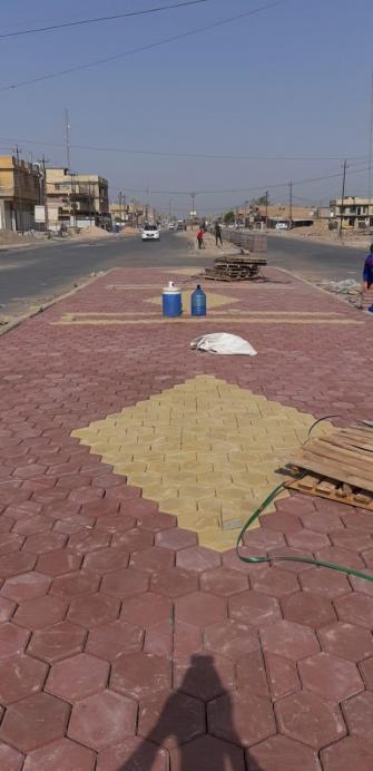 محافظ بغداديعلن انجاز تبليط شارع السوق الكبير في الحسينية